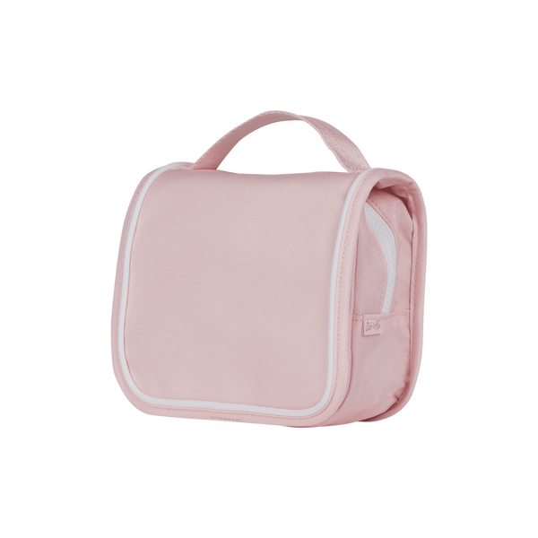 Compact, durable kids pink toiletry bag by Olli Ella. Perfect for toiletries and travel essentials. Ideal for organized packing, made from eco-friendly materials.