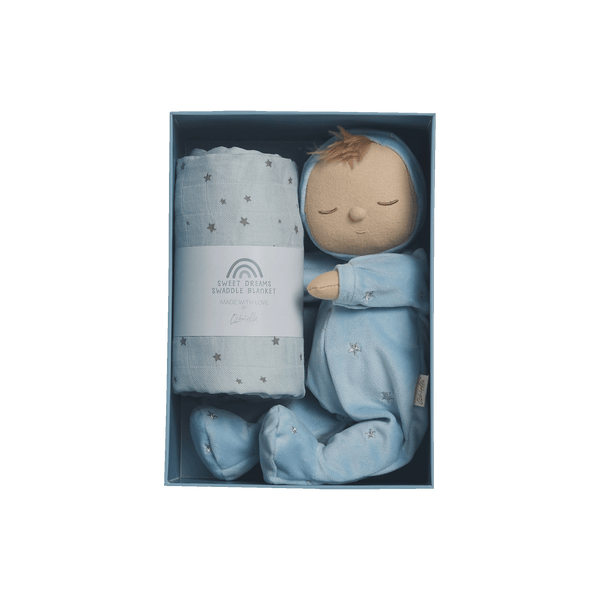 Keepsake gift set featuring a beautiful pink blue doll and matching swaddle cloth. The lullaby Leo includes a pompom on their bonnet that plays a sleepy tune when pulled, perfect for soothing newborns, making it the perfect gift for newborns and expecting parents.