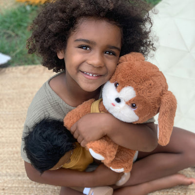 Plush dog toy with super soft fabric and velvety ears. Perfect for kids play and snuggles.