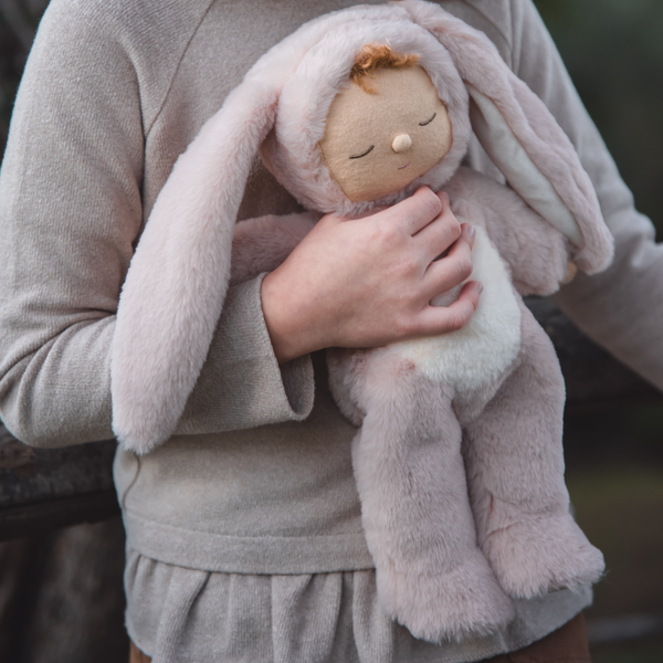 Super soft pink bunny plush doll, perfect from birth to all ages. This bunny soft toy is perfectly weighted and posable, making it the perfect addition to any toy collection.