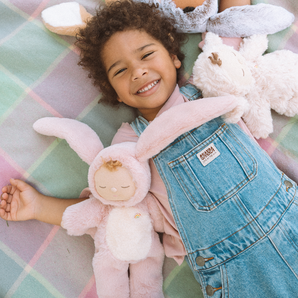 Super soft pink bunny plush doll, perfect from birth to all ages. This bunny soft toy is perfectly weighted and posable, making it the perfect addition to any toy collection.