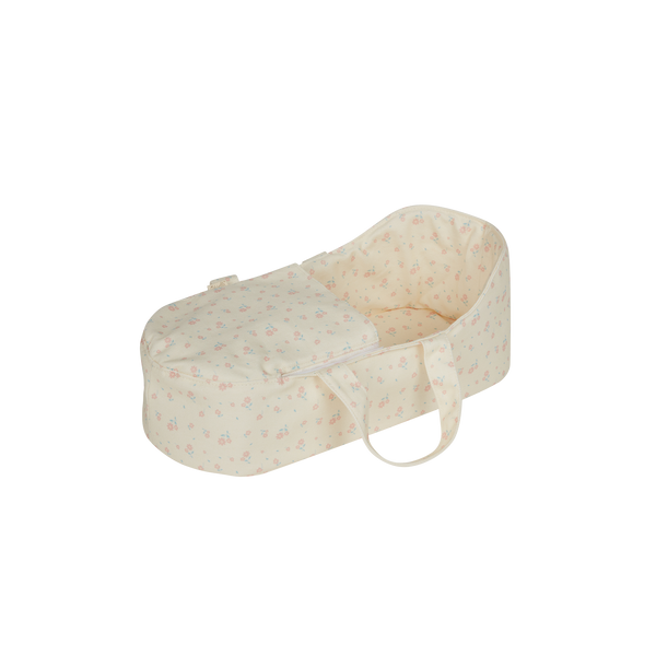 A pink flower printed doll carry cot with soft handles, perfect for little ones to cradle their favorite dolls. Ideal doll bedding, cozy carry cot for toddlers imaginative doll play.