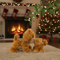 Two plush cats in a festive setting with a Christmas tree and stockings.