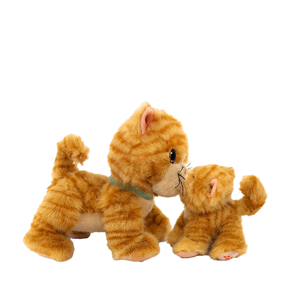 Two plush toy cats on a white background