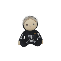 Plush toy in a black skeleton costume on a white background