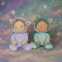 Two plush toys, one in a purple outfit with star-shaped ears and the other in a green outfit with dragon-like features, against a starry sky background.