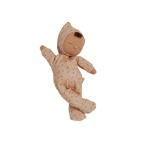 Pink, easter-themed plush doll, perfectly weighted and posable for imaginative doll play. Sodt and cuddly plush doll, an ideal companion from birth.