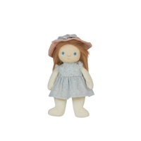 Stuffed doll with a pink hat and gray dress on a white background