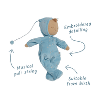 Blue posable plush doll suitable from birth. The Lullaby Leo includes a pompom on their bonnet that plays a sleepy tune when pulled. 