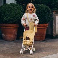 Olli Ella honey yellow doll pram for kids toys. For use with our posable dinkum dolls and matching changing bag and mat for imaginative doll play.