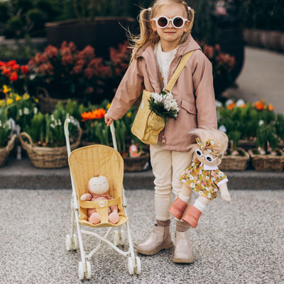 Olli Ella mustard yellow doll pram for kids toys. For use with our posable dinkum dolls and matching changing bag and mat for imaginative doll play.