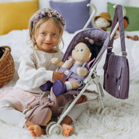 Olli Ella purple doll pram for imaginative doll play. play with our changing bag and mat to create a world of play with our dinkum dolls.