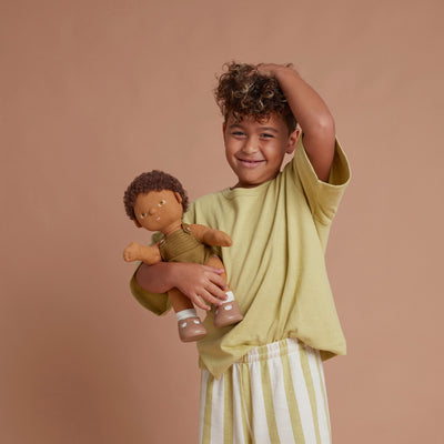 Gender-neutral, posable kids doll with brown hair and removable brown outfit. Dress them up and style their hair for hours of interactive kids play.