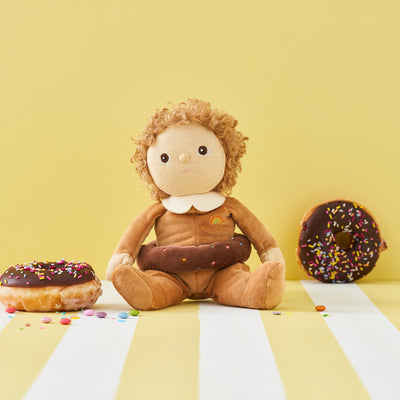 Limited-edition, palm sized, collectable kids plush toy. Darcy Donut is a chocolate donut weighted plush toy in a velvet onsie, perfect for imaginative kids play.