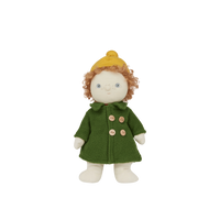 Stuffed doll with a green coat and yellow hat on a white background