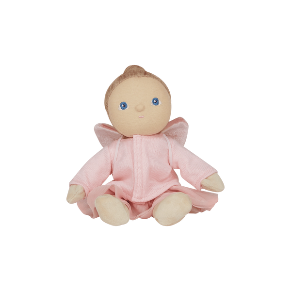 Stuffed toy baby doll in a pink outfit with angel wings on a white background