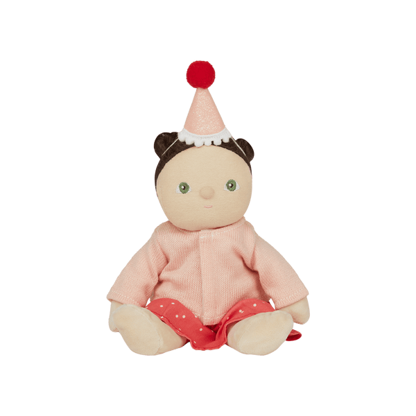 cute sitting doll with hat in a pink cardigan and spot dress