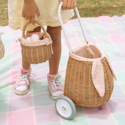 Rattan wheely basket with printed lining. Easter themed basket on wheels for kids to transport or store their favourite toys and treasures.