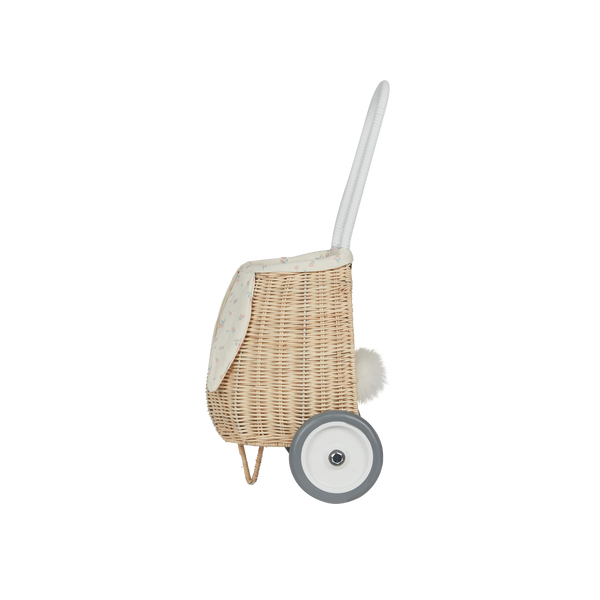 Rattan wheely basket with printed flower lining. Easter themed basket on wheels for kids to transport or store their favourite toys and treasures.