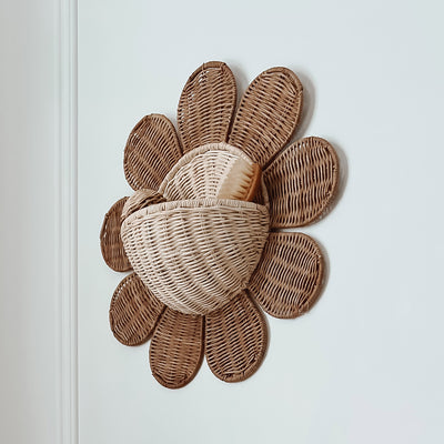 Daisy shaped rattan wall basket. A unique, flower shaped storage solution and beautiful rattan décor, perfect for your home or nursery. 