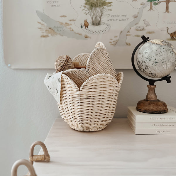 Set of off-white rattan baskets. Beautiful nesting baskets perfect for every nursery or play space, use as storage for dolls, toys or baby essentials.