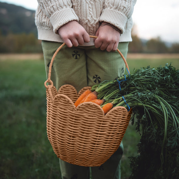 Rattan carry basket, perfect for market mornings, nurseries and playspaces. Designed to carry in and out of the home, fill with essentials, toys, dolls, flowers and everything in between.