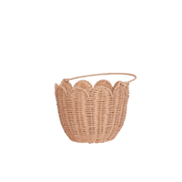 Handwoven pink rattan carry basket, perfect for kids to carry and collect treaures. Fill with dolls and toys, or use as a home décor storage solution in a nursery or bedroom.