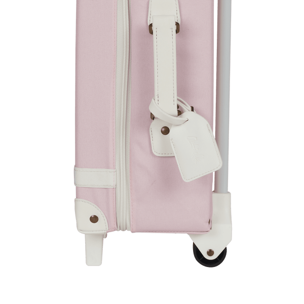 Charming pink kids travel suitcase by Olli Ella. Ideal for children's travel, with a spacious interior and playful colours. Constructed from recycled plastic bottles