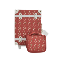 Olli Ella Christmas Theme See-ya Washbag red print pictured with suitcase