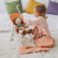 Olli Ella pink doll pram for imaginative doll play.