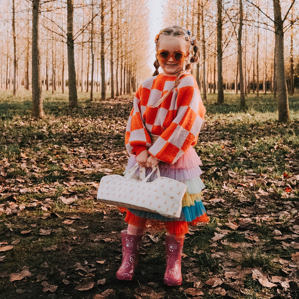 Rainbow printed fabric carry cot for kids toys and dolls. Spark imaginative kids play with this doll carry cot.