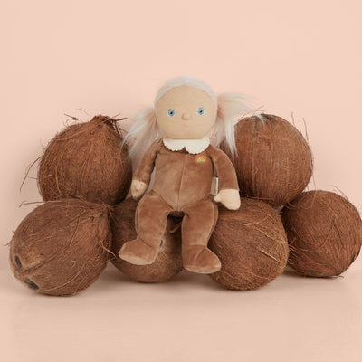 A limited-edition palm-sized plush toy, perfectly weighted in all the right places, and outfitted in a snuggly plush velvety Coconut suit.