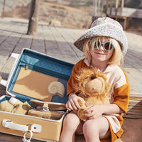 The ultimate kids travel suitcase. Yellow suitcase for kids holidays, with straps to carry their favourite doll / toy.