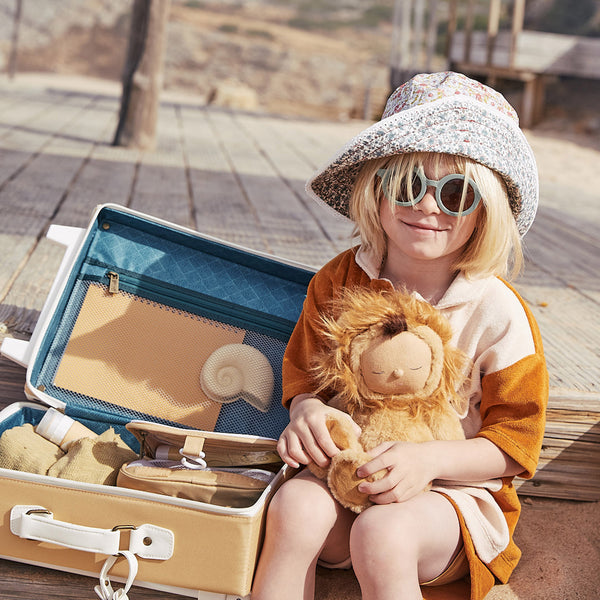 The ultimate kids travel suitcase. Yellow suitcase for kids holidays, with straps to carry their favourite doll / toy.