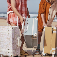Kids travel suitcase in mushroom print. The perfect kids suitcase for holidays with compartments for dolls and trinkets.