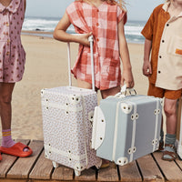 Kids travel suitcase in mushroom print. The perfect kids suitcase for holidays with compartments for dolls and trinkets.
